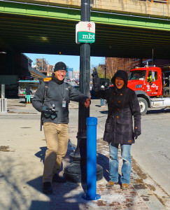 Tracy Hadden Loh (right) and colleague with the pedestrian counter outside the CTH. 
