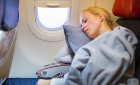 feature-woman-asleep-on-airplane-274x168